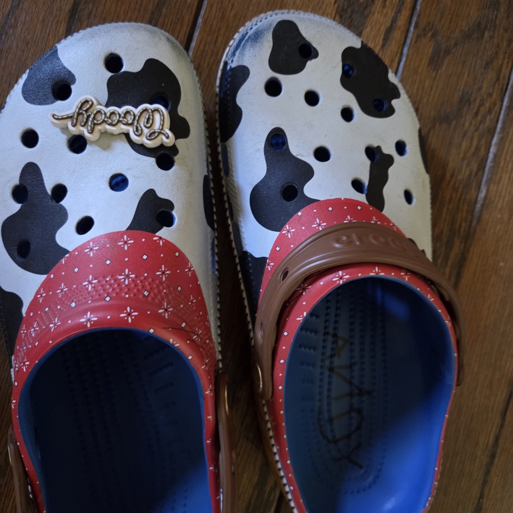CROCS Kids Cow Print Slippers with Red and Brown Accents